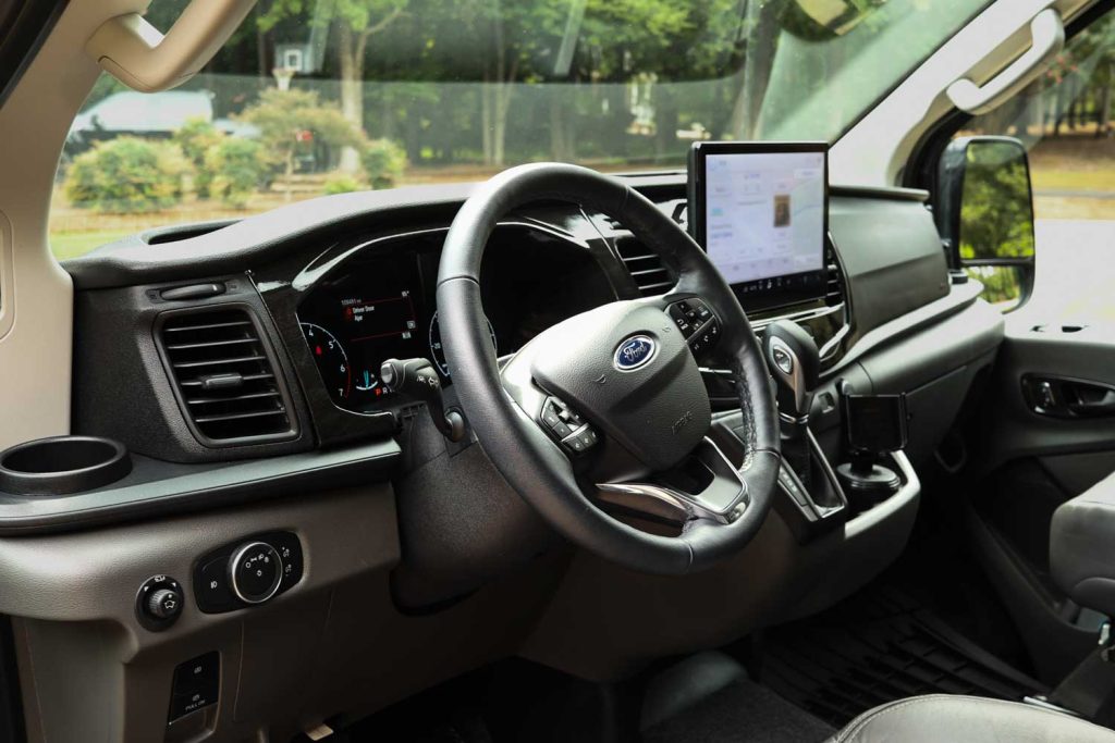 Interior view of a modern medical transport vehicle dashboard.