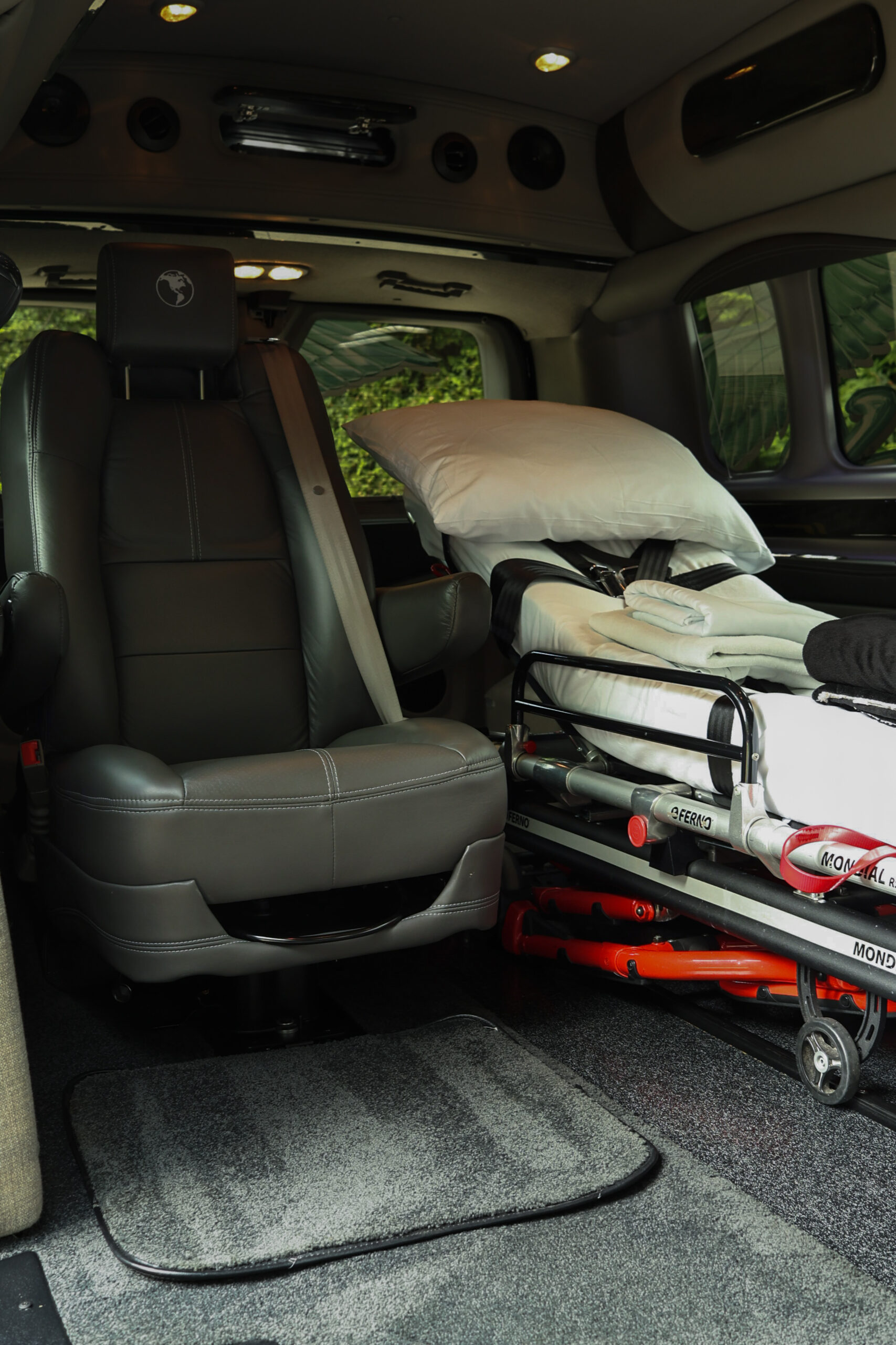 Luxury minivan with stretcher and seating for safe medical transport.